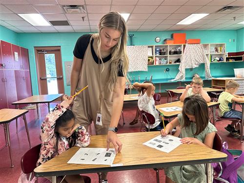 Emily Moss works with students at Cane Creek during the PCSS Summer Learning Camp.